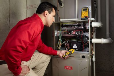Furnace Repair Union City Heating technician diagnosing a furnace repair in Union City